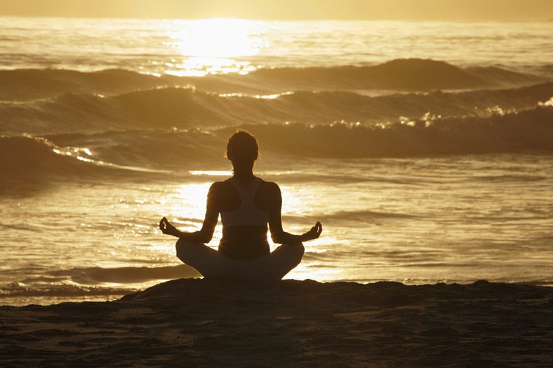 meditating-yoga-beach-front - Blue Osa Yoga Retreat + Spa