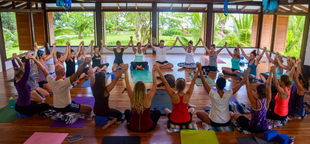 Yoga Teacher Training Group of Students Sitting in a Circle in the Blue Osa Yoga Retreat & Spa Yoga Shala in Costa Rica